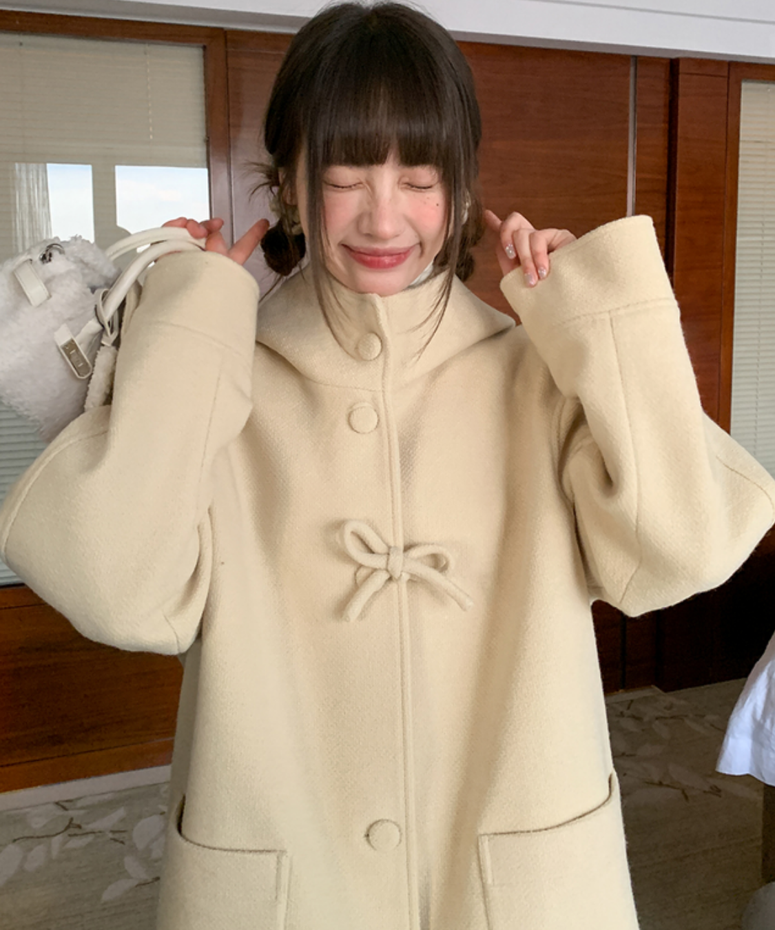 フード付きくるみボタンリボンデザインロングコート