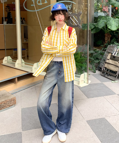 ボタンフライウォッシュドヴィンテージ風デニムパンツ