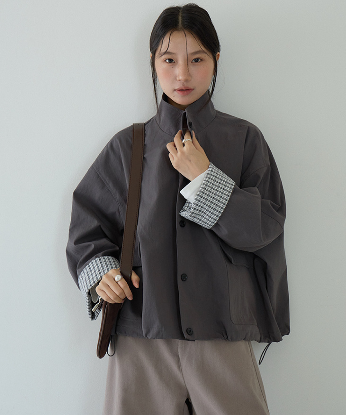 スタンドカラーカフスチェック柄ドローストリングジャケット