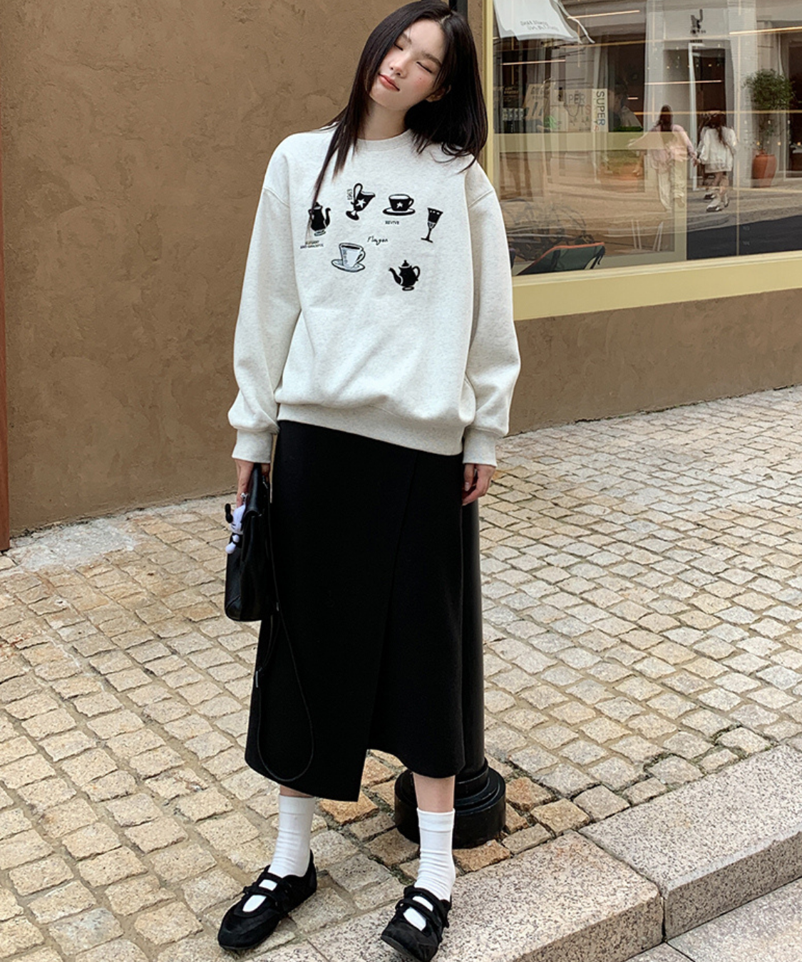 トグルボタン付きアシメラップ風スカート