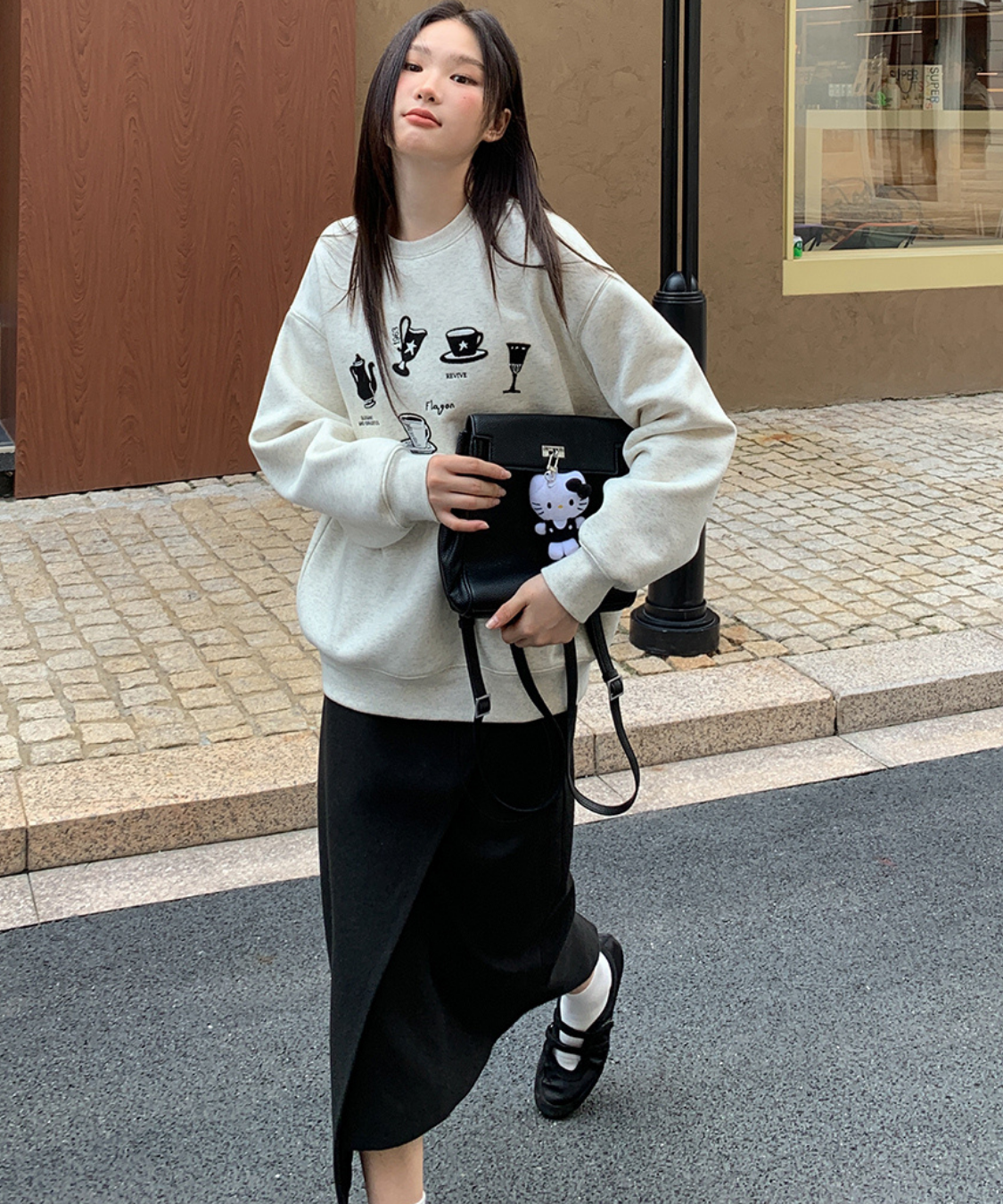 トグルボタン付きアシメラップ風スカート