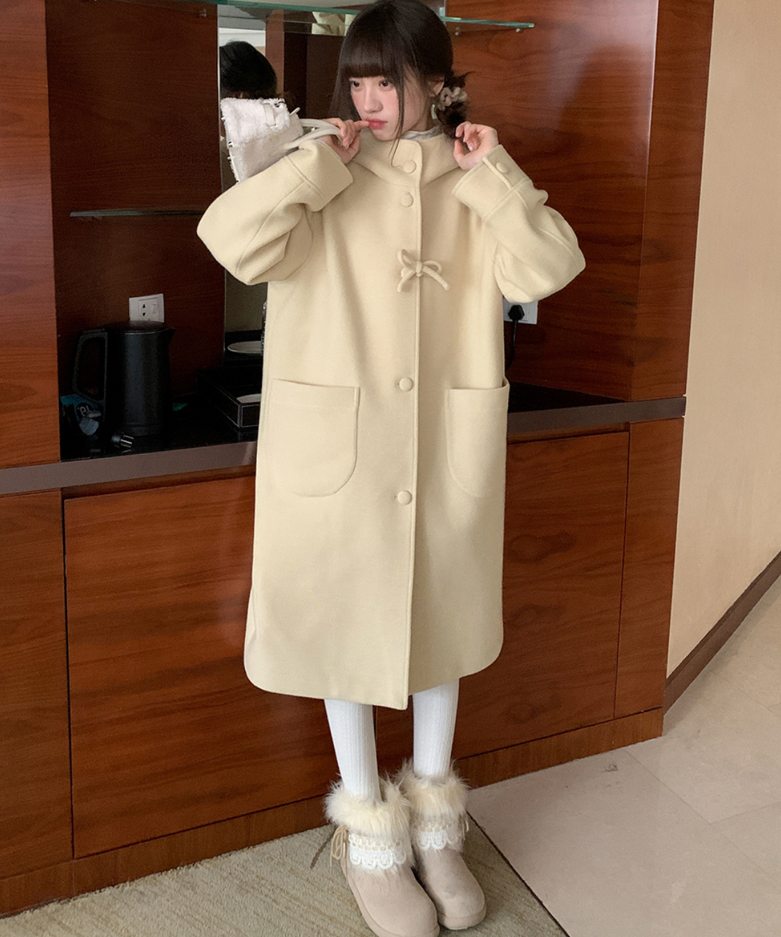 フード付きくるみボタンリボンデザインロングコート