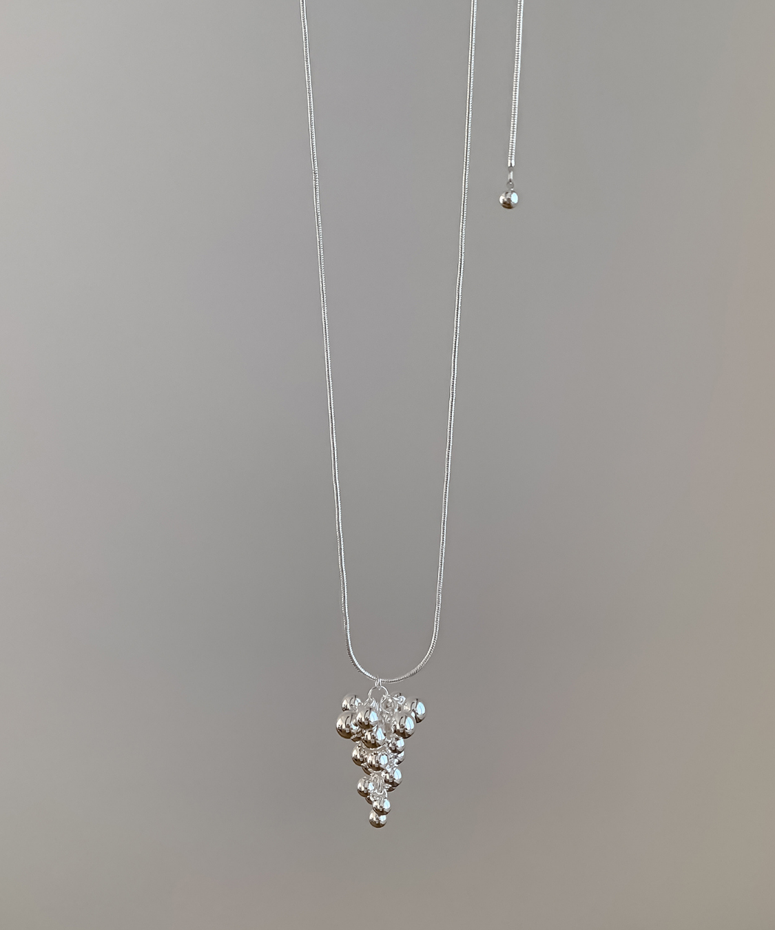 シルバーボールモチーフロングネックレス