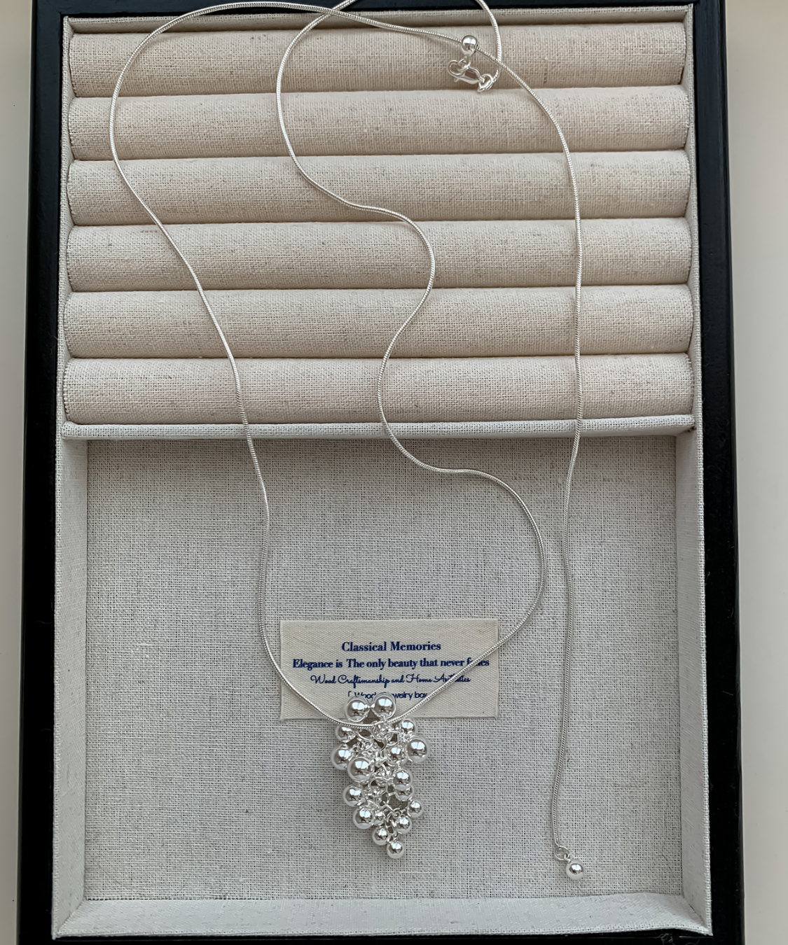 シルバーボールモチーフロングネックレス