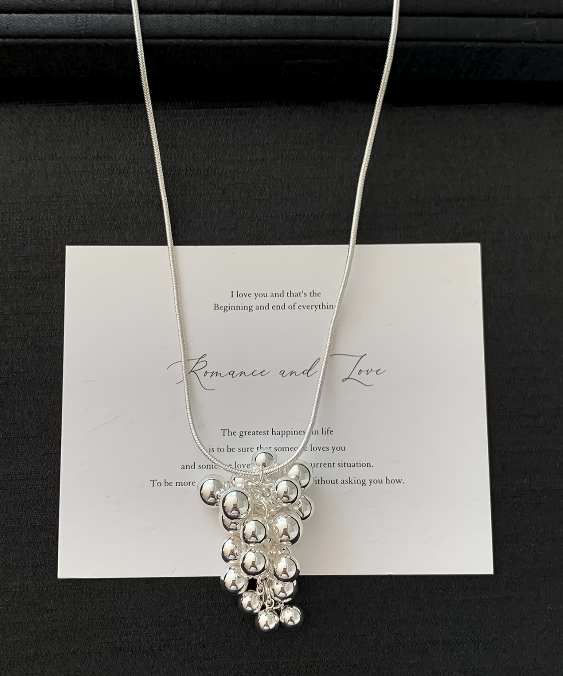 シルバーボールモチーフロングネックレス