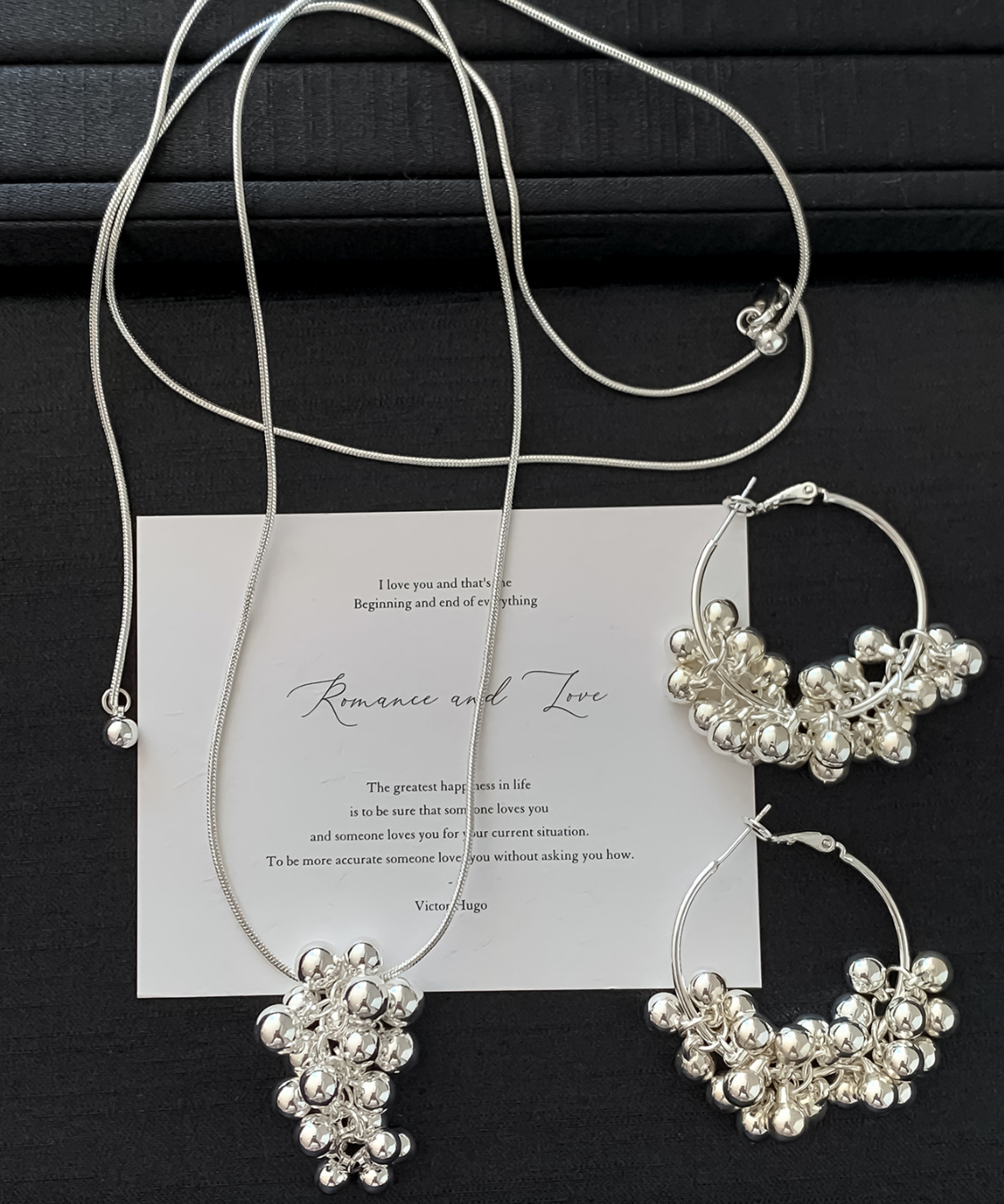 シルバーボールモチーフロングネックレス